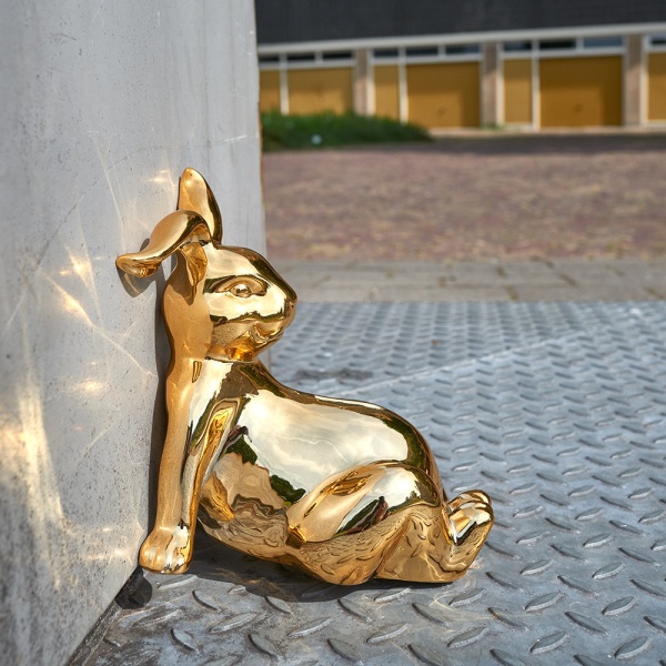 gold-bunny-money-box-sitting-778087
